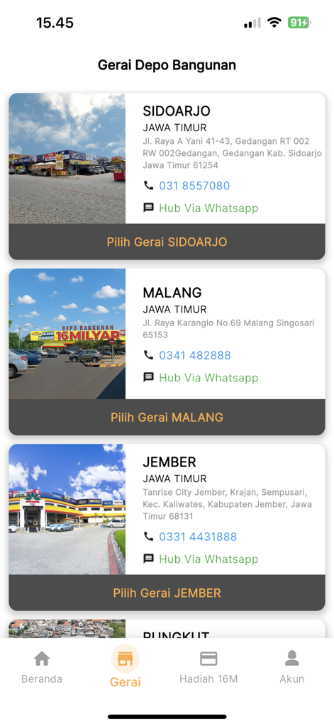 A list of Depo Bangunan store outlets in a mobile app showing addresses and contact details