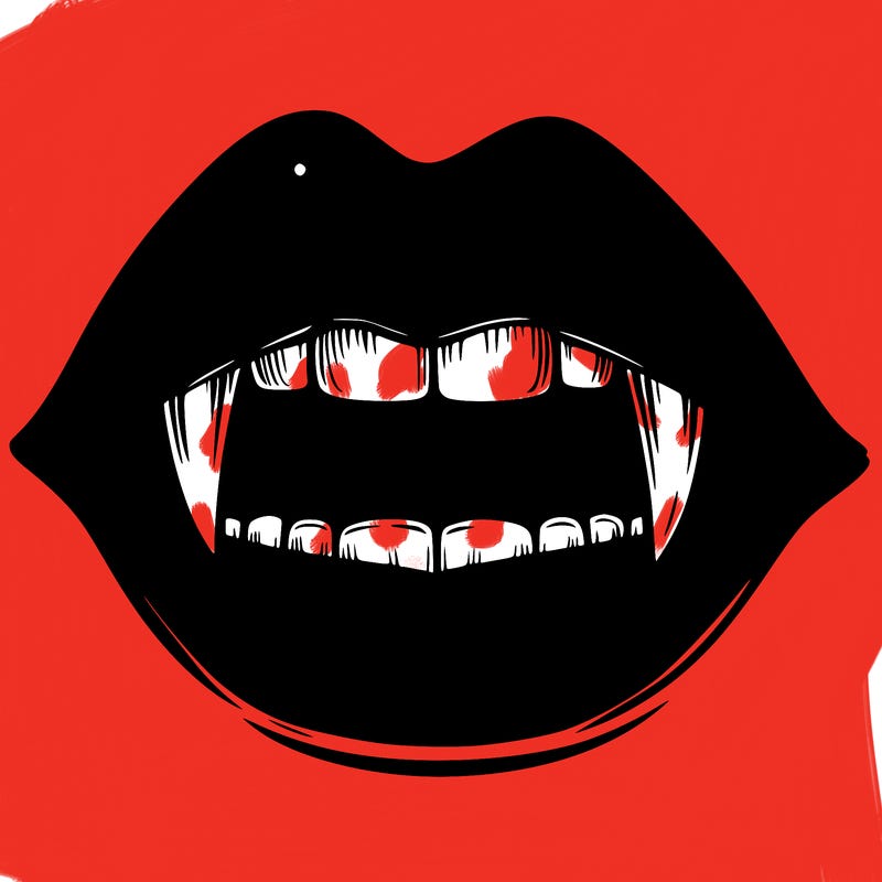 lips with vampire teeth