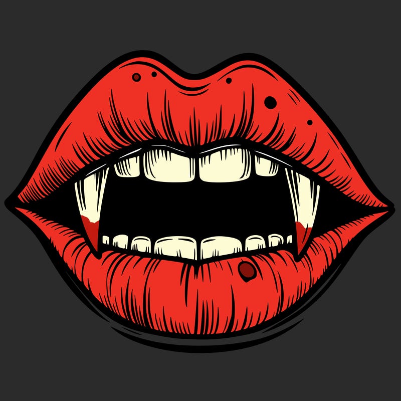 lips with vampire teeth