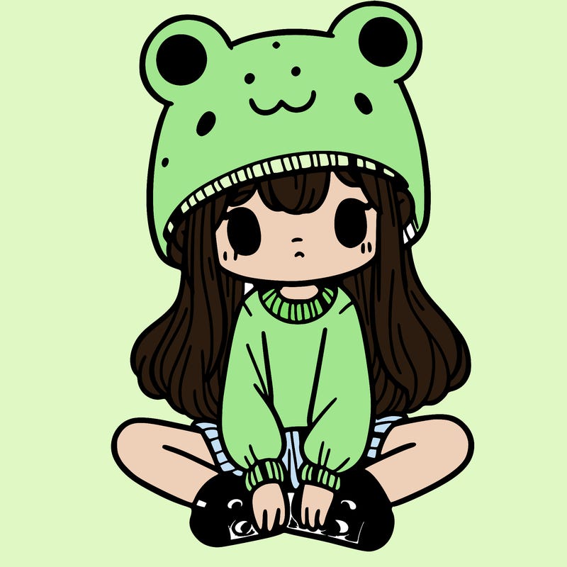 a girl wearing a frog hat and some frog socks