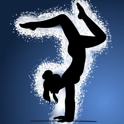 a woman doing a handstand