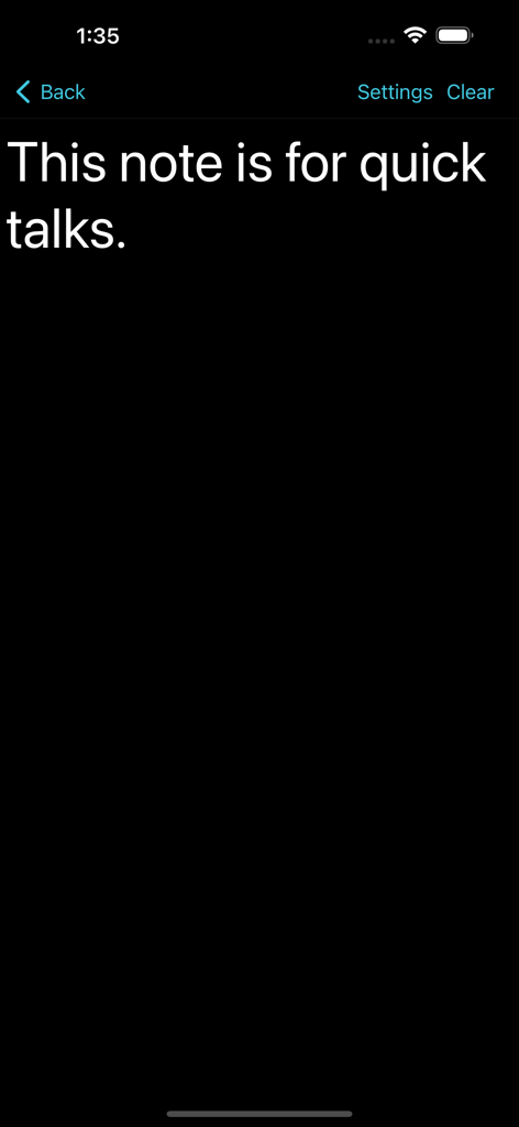 Big Note. - Une interface à fort contraste de l'application Big Note montrant un grand texte blanc sur fond noir pour une meilleure lisibilité