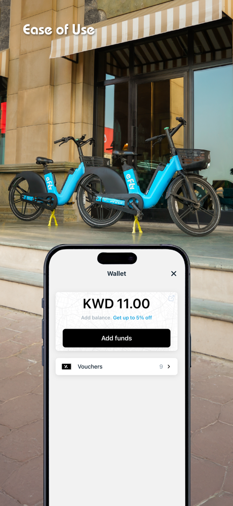E-FLY app wallet screen showing balance next to two parked blue electric bicycles.