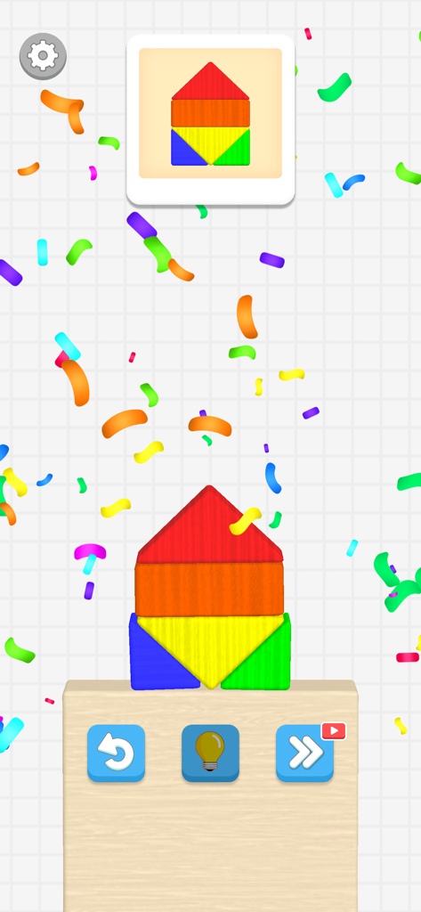 Color Block Builder - Una forma di casa costruita con blocchi colorati nel gioco puzzle di Color Block Builder