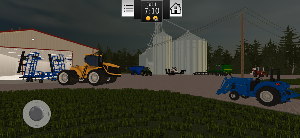 A variety of tractors and farming machinery parked outside a barn and silos in the Farming USA 2 simulation game.