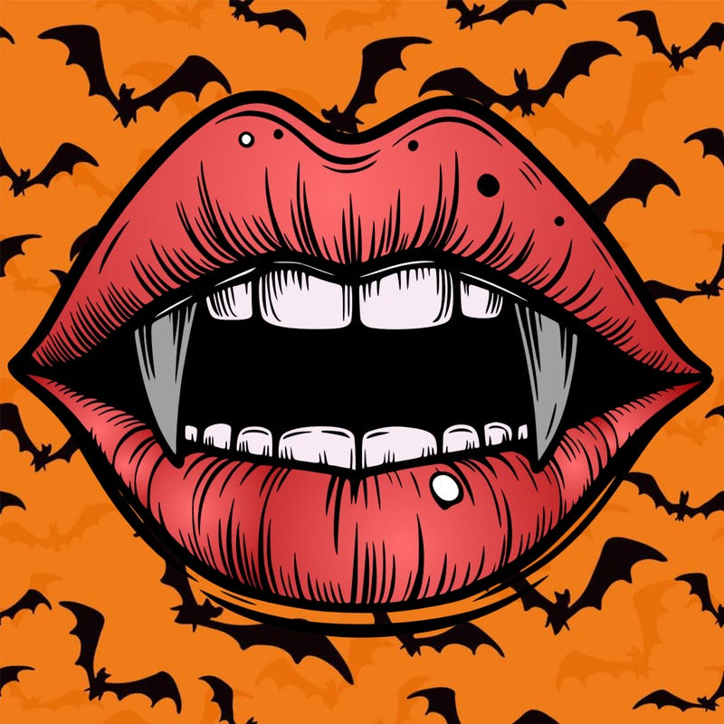 lips with vampire teeth