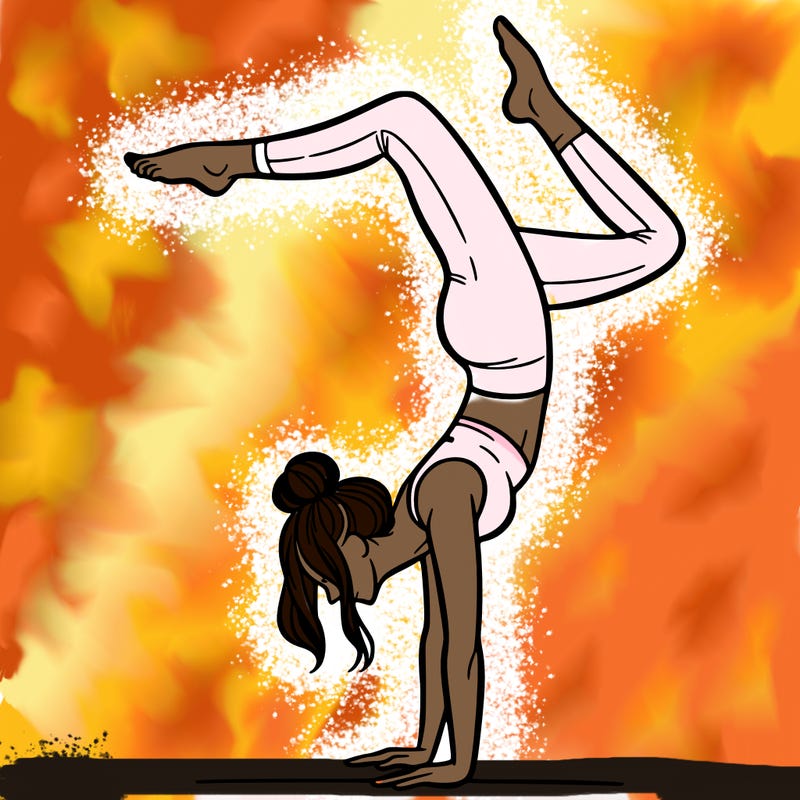 a woman doing a handstand