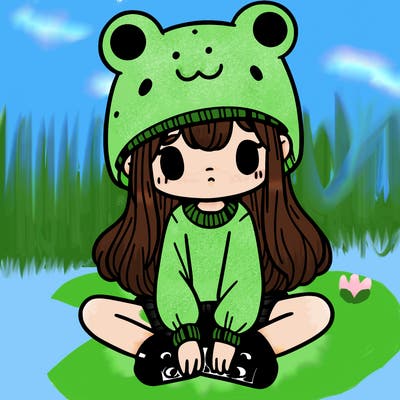 a girl wearing a frog hat and some frog socks