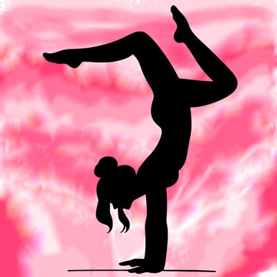a woman doing a handstand