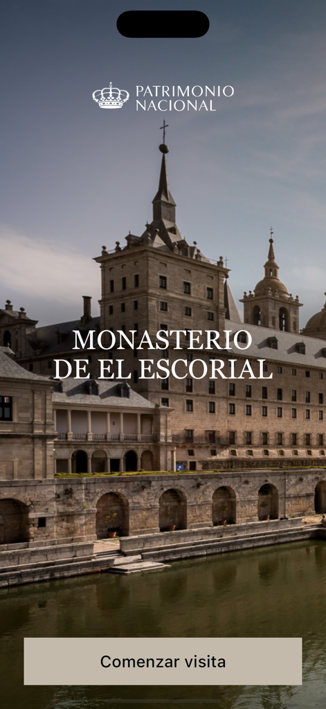 Monasterio El Escorial - Ecrã oficial de boas-vindas da aplicação móvel do Mosteiro do Escorial com uma vista do edifício histórico e botão de início