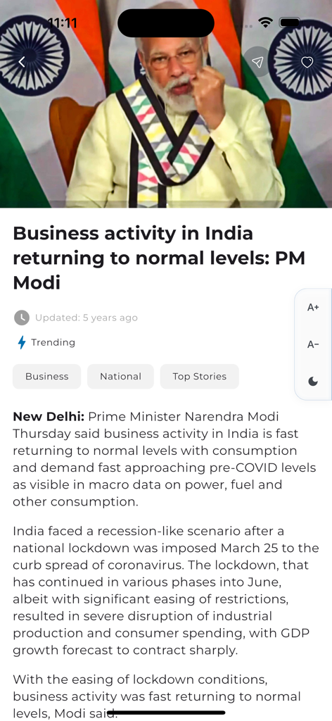 OrissaPOST app interface displaying a news article about Indian business activity featuring Prime Minister Narendra Modi