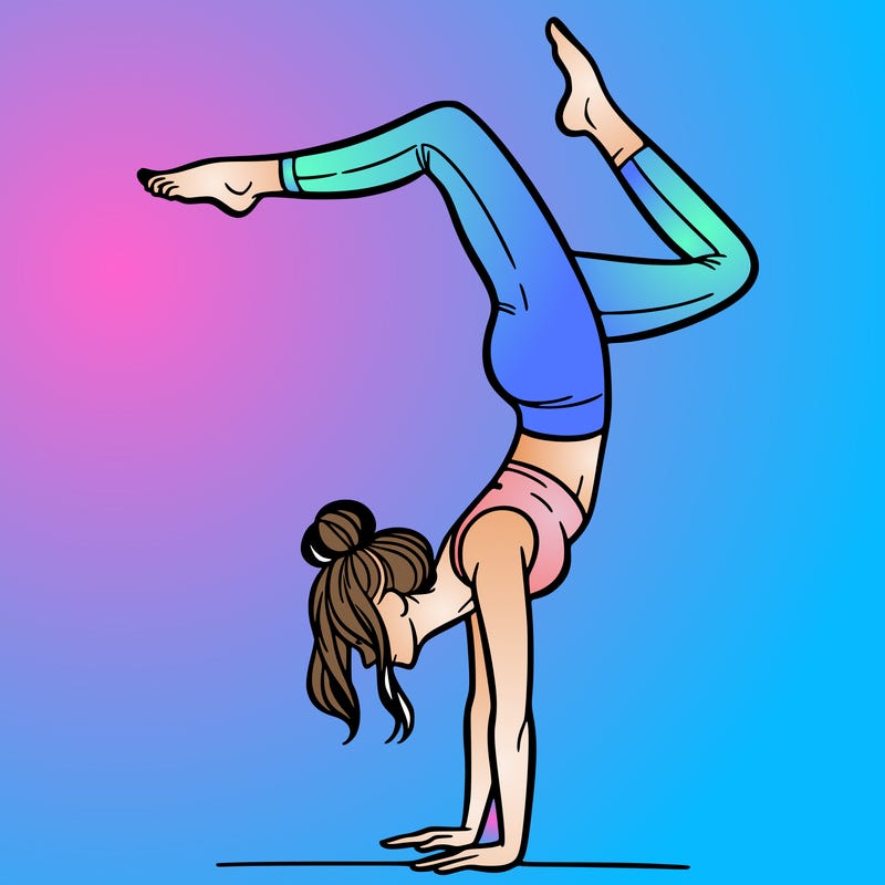 a woman doing a handstand