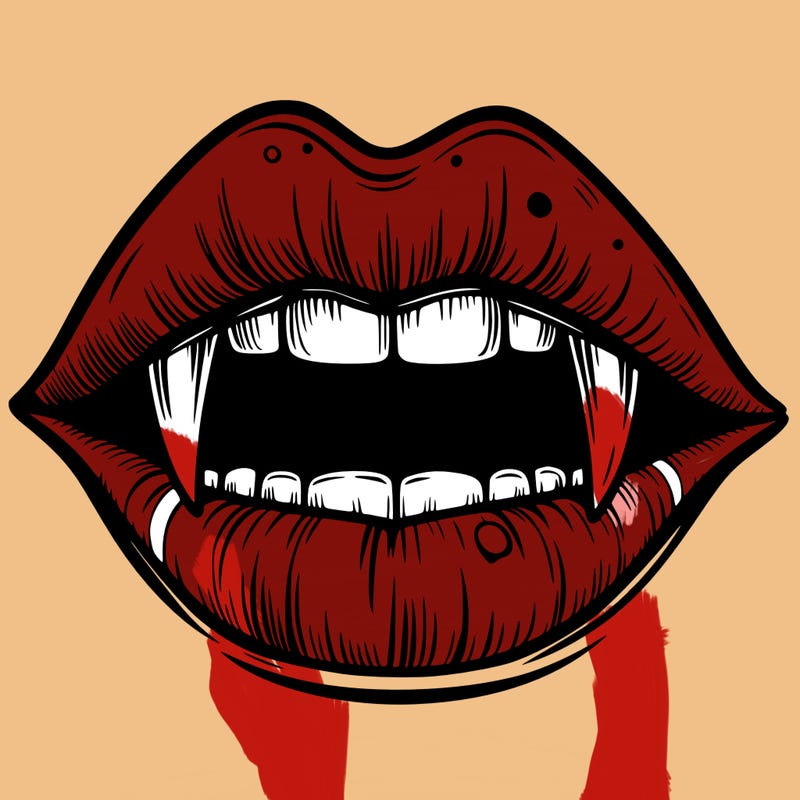 lips with vampire teeth