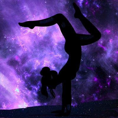 a woman doing a handstand