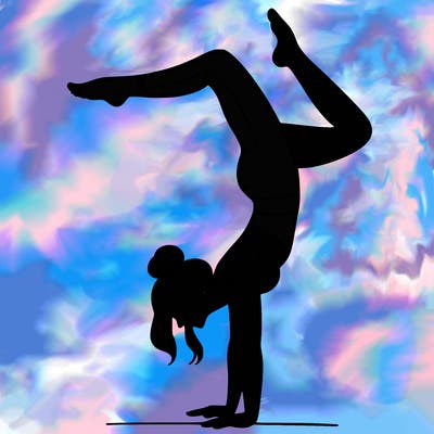a woman doing a handstand