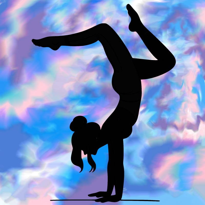 a woman doing a handstand