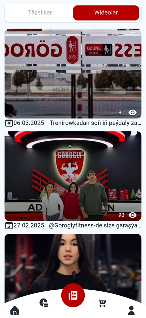 Seção de vídeos do aplicativo móvel Gorogly Fitness mostrando instalações da academia e instrutores