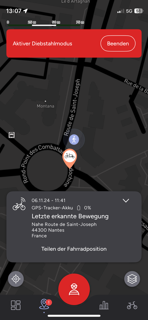 Muli app interface displaying active theft mode and GPS tracking location of a cargo bike on a city map