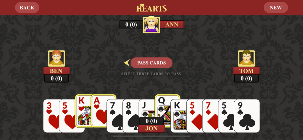 Gameplay-Bildschirm des Hearts-Kartenspiels, der eine Hand mit Karten und die Anweisung zum Weitergeben von Karten zeigt
