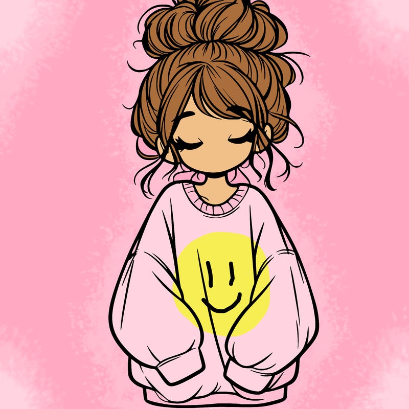 girl with baggy sweatshirt and messy bun