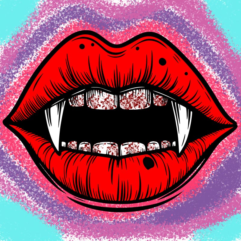 lips with vampire teeth