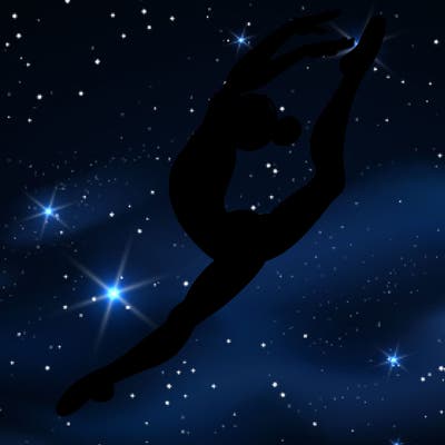 gymnast doing a leap in a leotard with a bent back leg