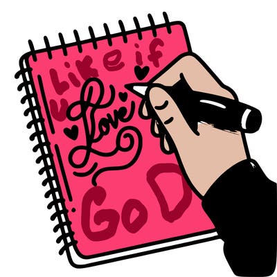 a hand writing “love” in calligraphy on a notebook