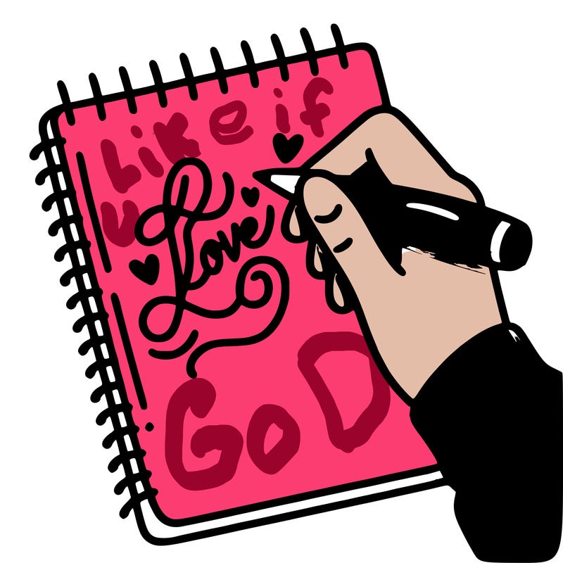 a hand writing “love” in calligraphy on a notebook