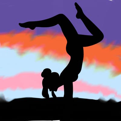 a woman doing a handstand