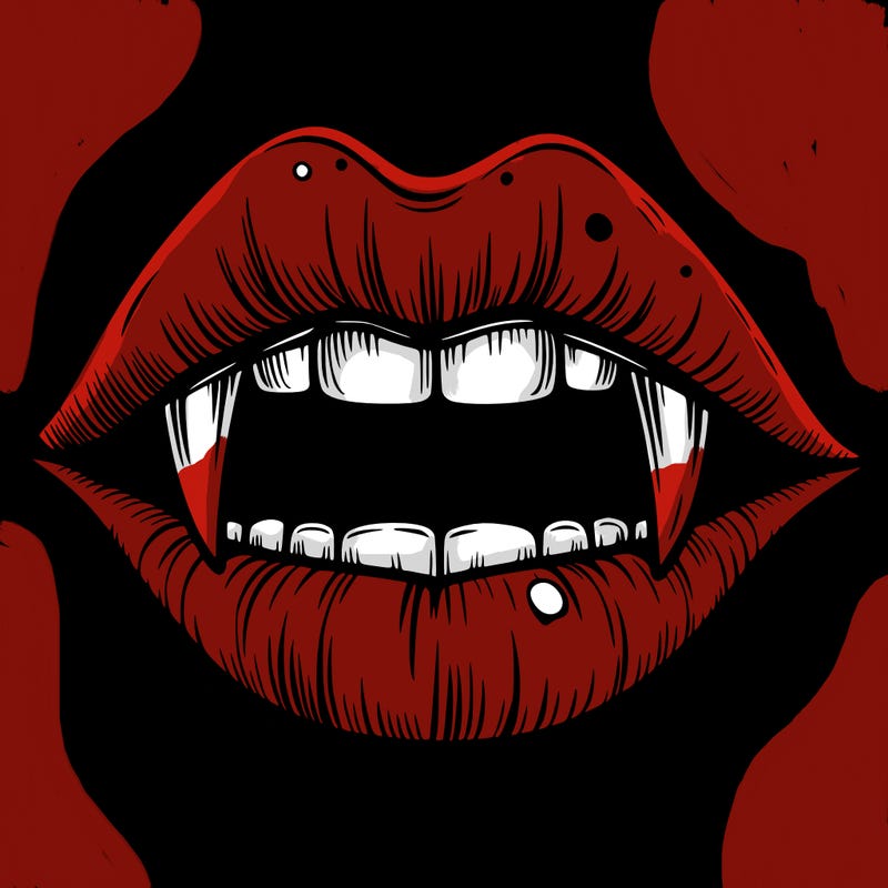 lips with vampire teeth