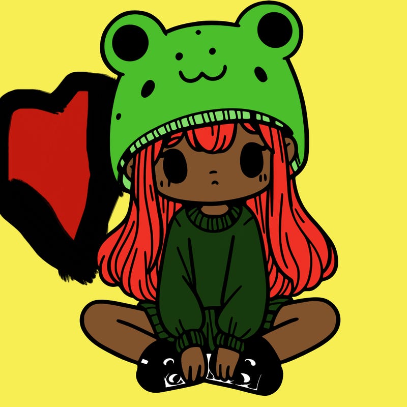 a girl wearing a frog hat and some frog socks
