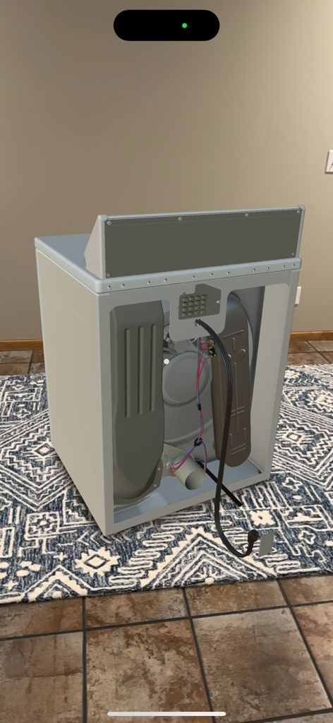 Appliance Repair Sim: Dryer - Augmented reality view of a dryer with the back panel removed showing internal wiring and components