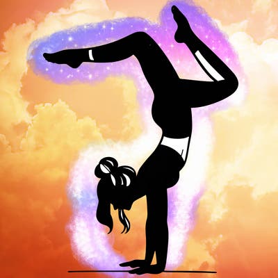 a woman doing a handstand