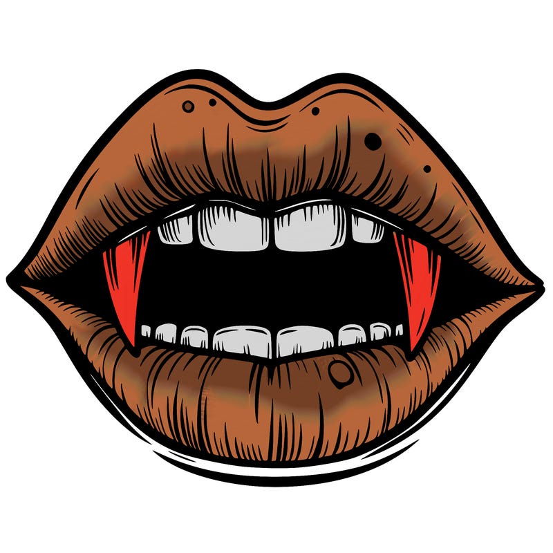 lips with vampire teeth