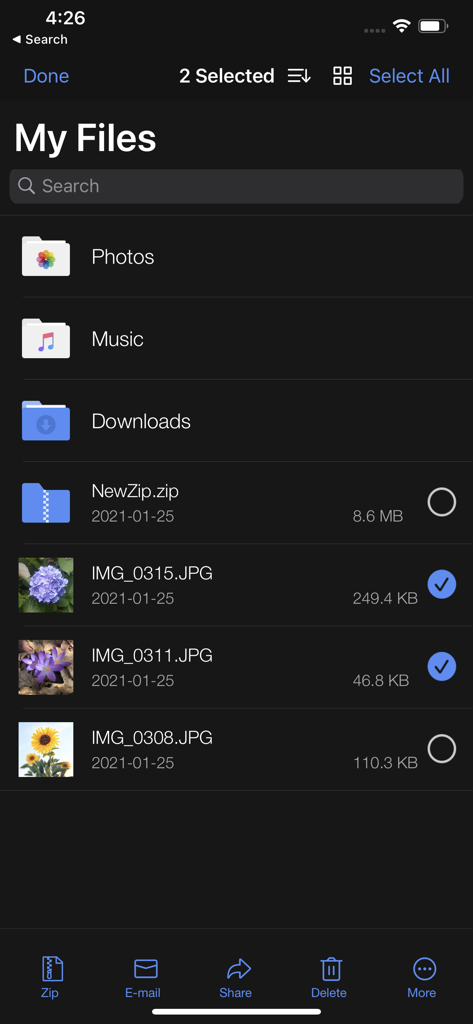 WinZip: #1 zip & unzip tool - Interface de l'application WinZip sur iPhone affichant l'écran « Mes fichiers » avec deux photos sélectionnées pour la compression ou le partage.