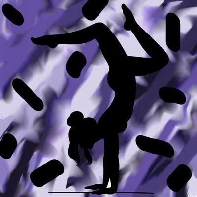 a woman doing a handstand