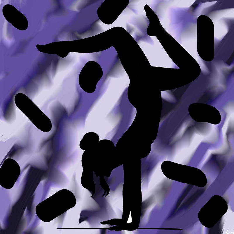 a woman doing a handstand