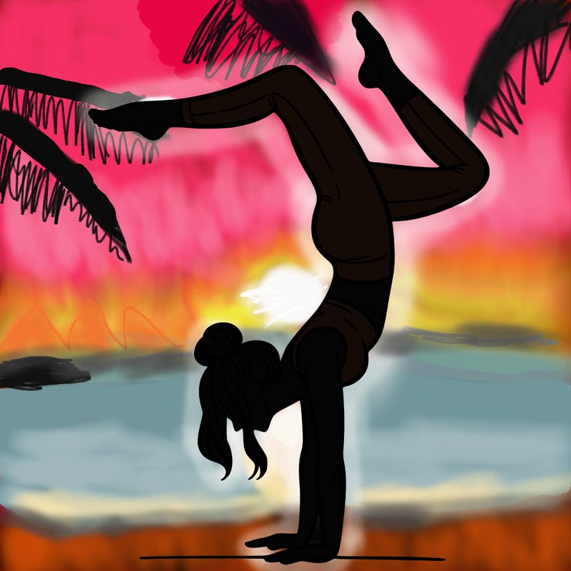 a woman doing a handstand