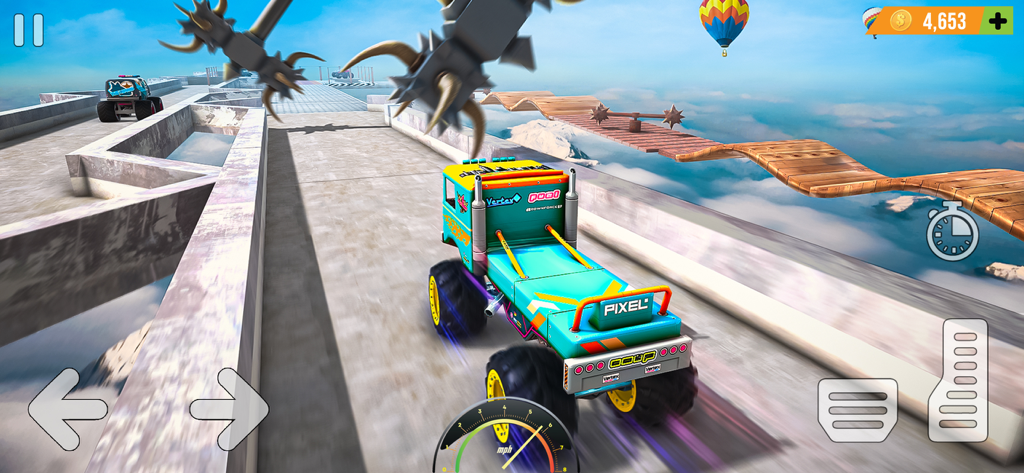 A monster truck driving on a high altitude obstacle course with ramps and spikes