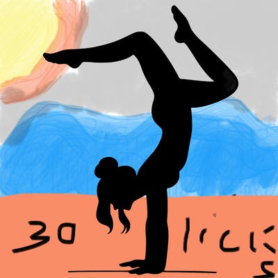 a woman doing a handstand