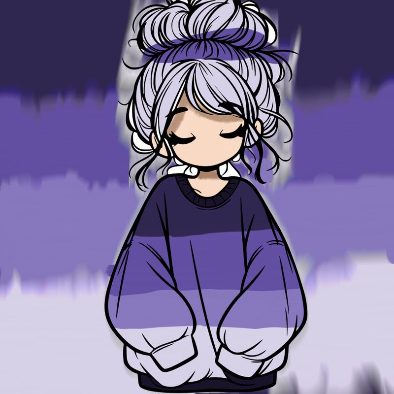 girl with baggy sweatshirt and messy bun