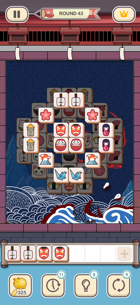 Jugabilidad del puzzle de coincidencia 3 de Tile Fun con losetas y fondo temáticos japoneses