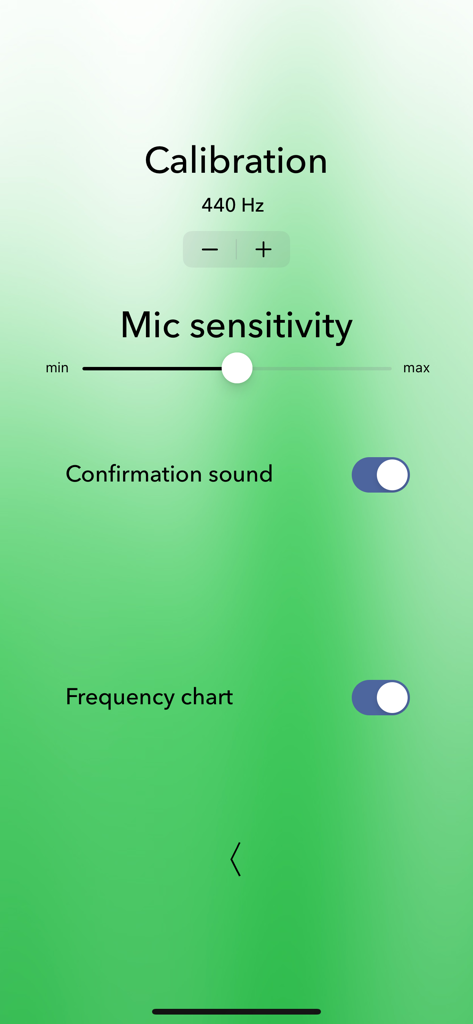 Settings screen of the Classical Guitar Tuner Pro app showing calibration and microphone sensitivity options