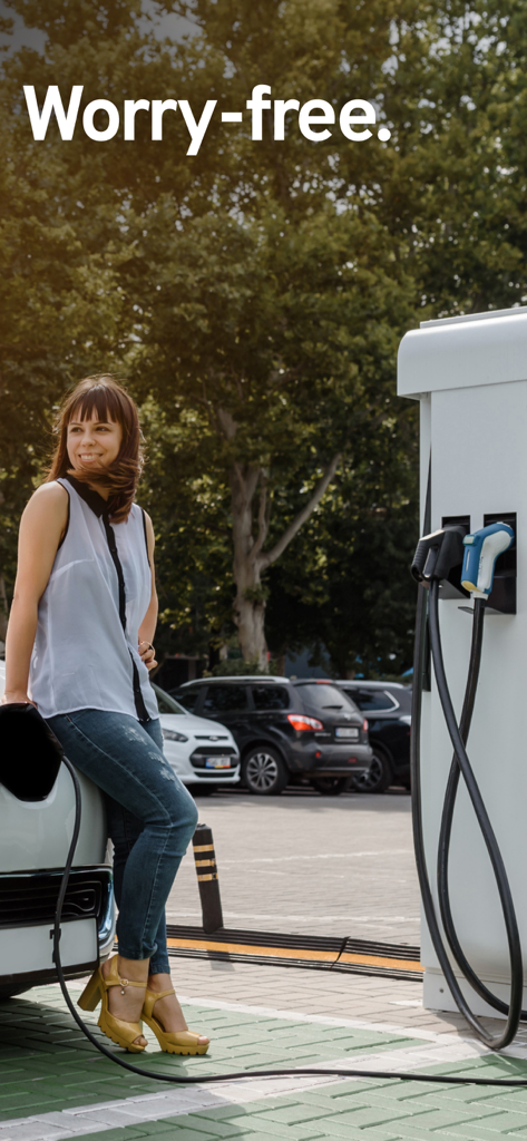 ladeapp – EV charging stations - A woman smiling and leaning on her electric car at a charging station with the text Worry-free