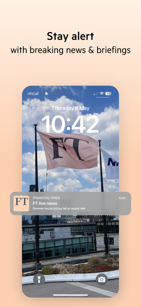 Notification de dernière minute de l'application Financial Times sur l'écran de verrouillage d'un iPhone.