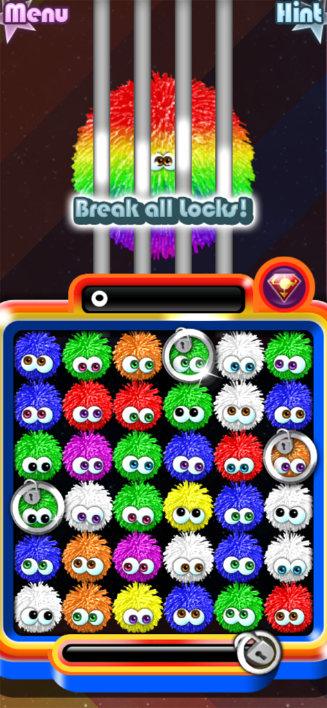Chuzzle 2 - Chuzzle 2 gameplay screen showing a match-3 puzzle grid with colorful fuzzy characters and locks to break.