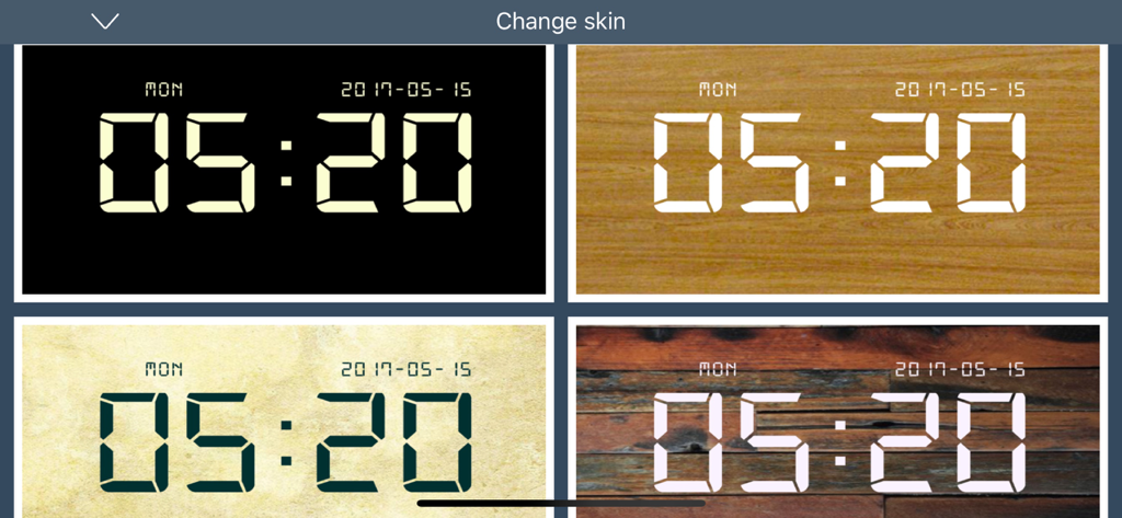 selection of different digital clock skins including wood and minimalist black backgrounds