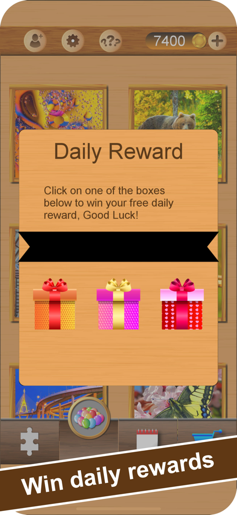 Amazing Jigsaw - Brain Puzzles - Daily reward pop-up screen showing three colorful gift boxes in the Amazing Jigsaw app.