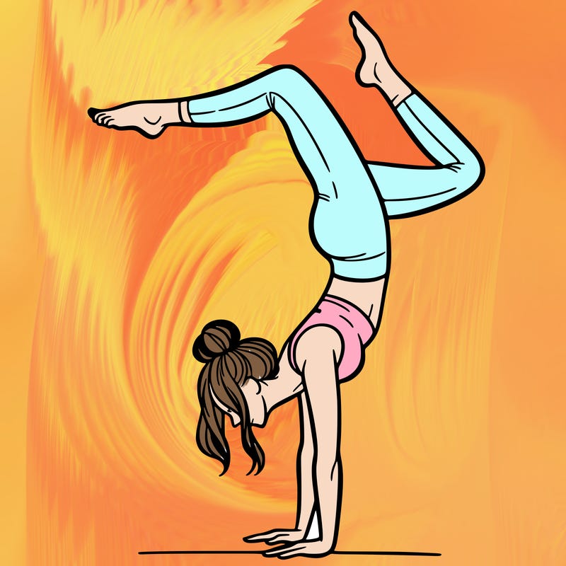 a woman doing a handstand