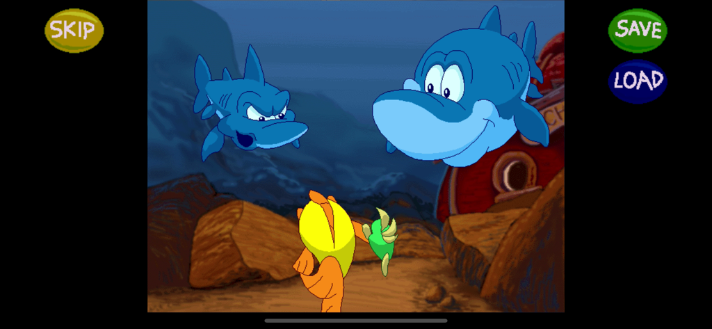 Freddi Fish 2: Haunted School - Freddi Fish y Luther conociendo a dos tiburones azules bajo el agua